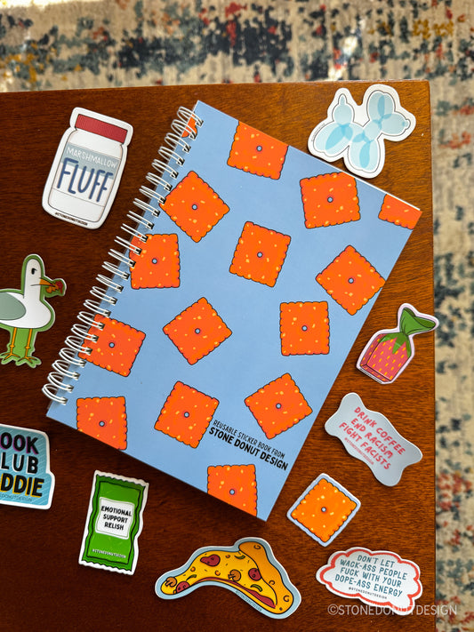 Cheezy Cracker Reusable Sticker Book (50 double-sided pages)