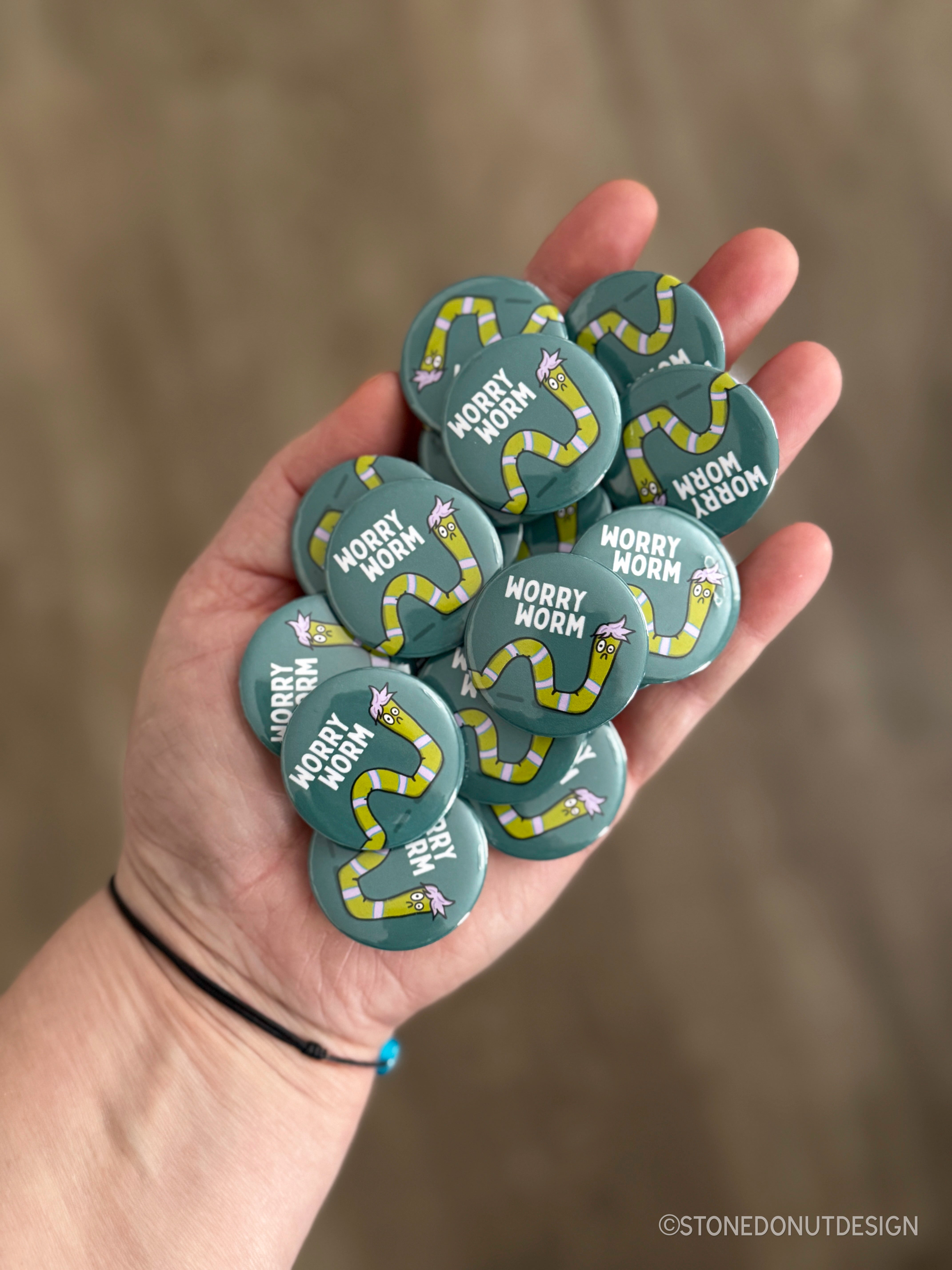 Worry Worm Pinback Button – Stone Donut Design